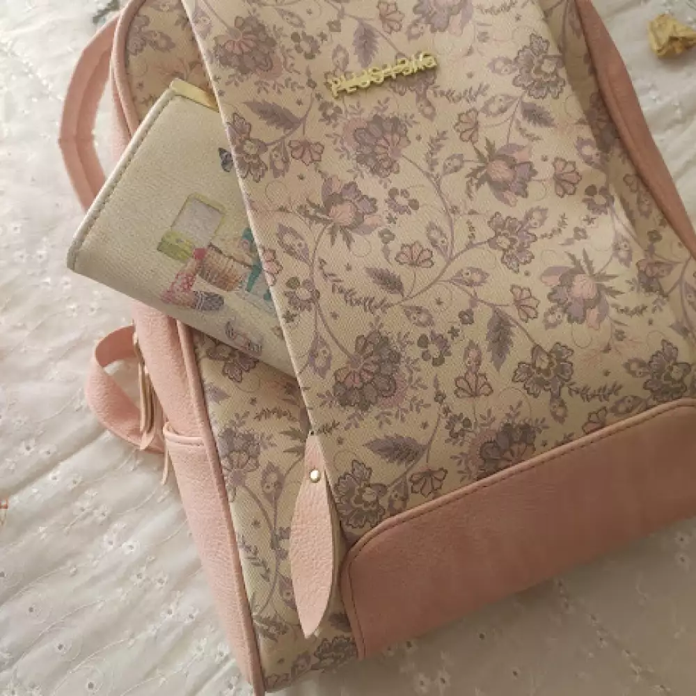 Morral rosa vintage con cremallera y bolsillos múltiples