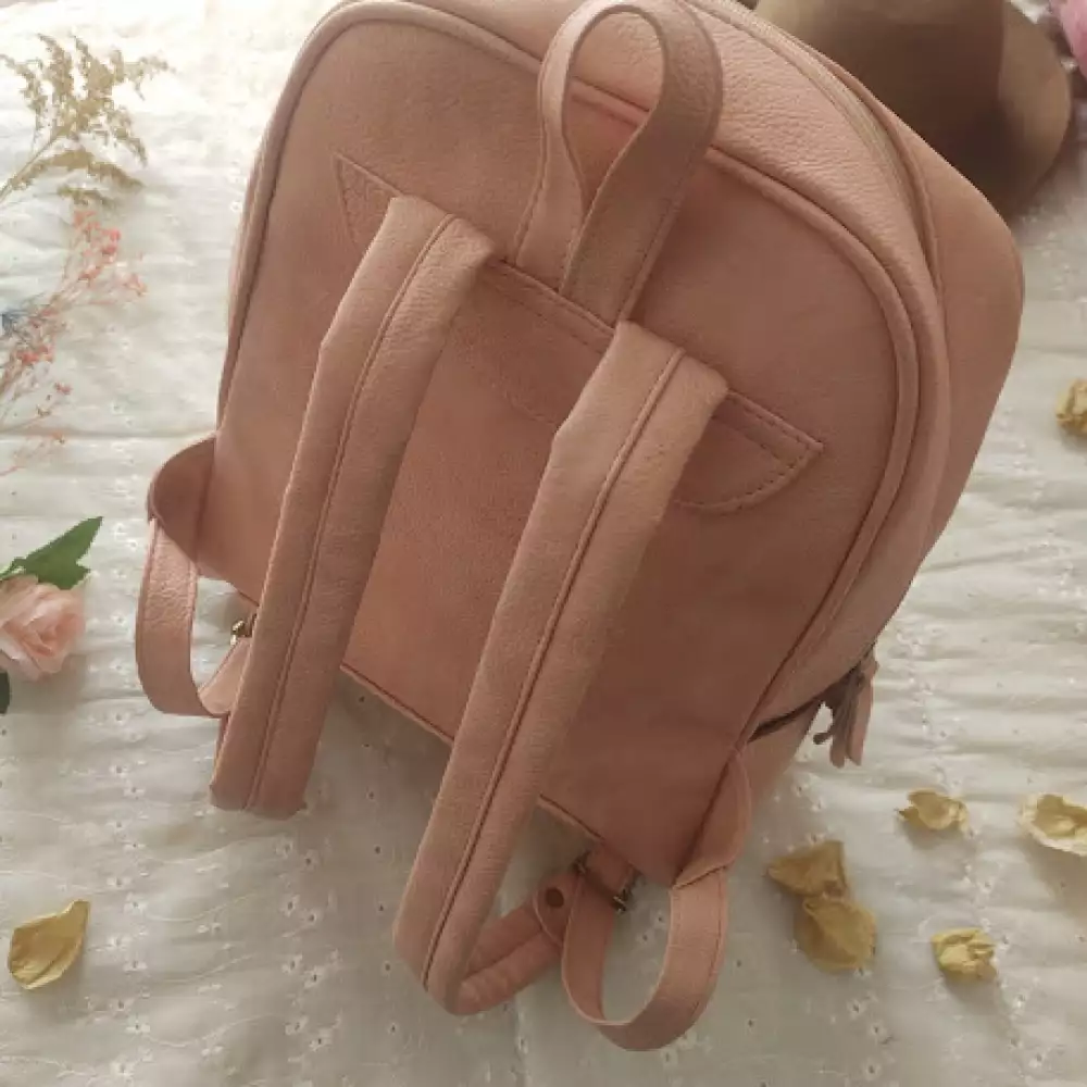 Morral rosa vintage con cremallera y bolsillos múltiples