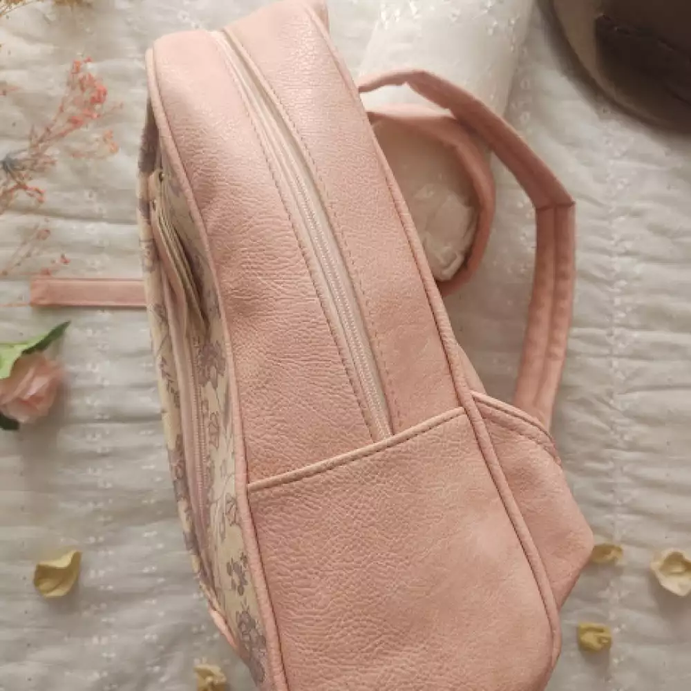 Morral rosa vintage con cremallera y bolsillos múltiples