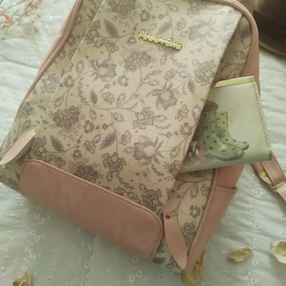 Morral rosa vintage con cremallera y bolsillos múltiples