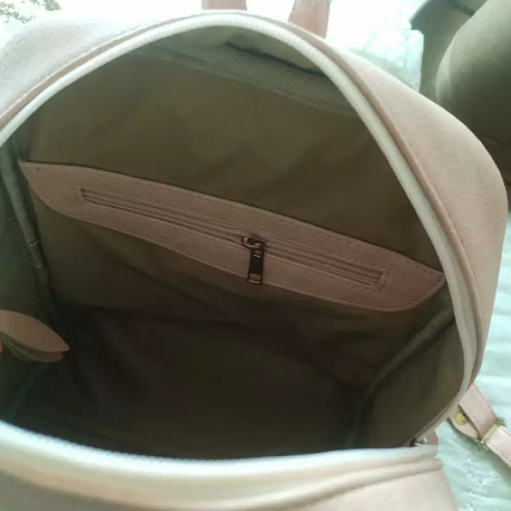 Morral rosa vintage con cremallera y bolsillos múltiples