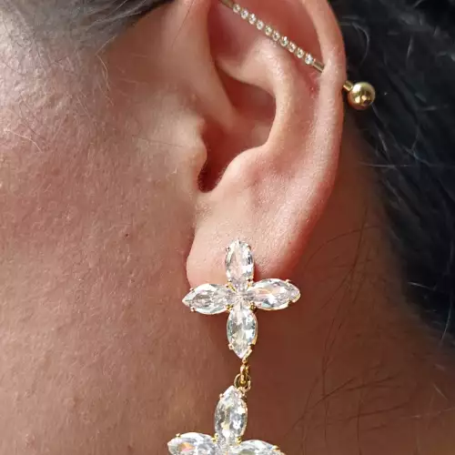 Aretes con estrellas doradas y zircones para mujer