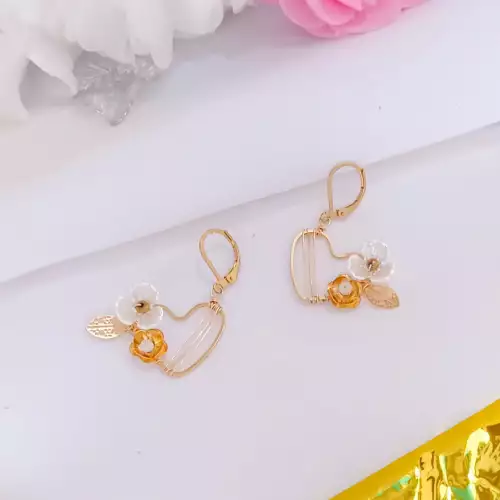 Aretes corazón en goldfield y acrílico acero inoxidable