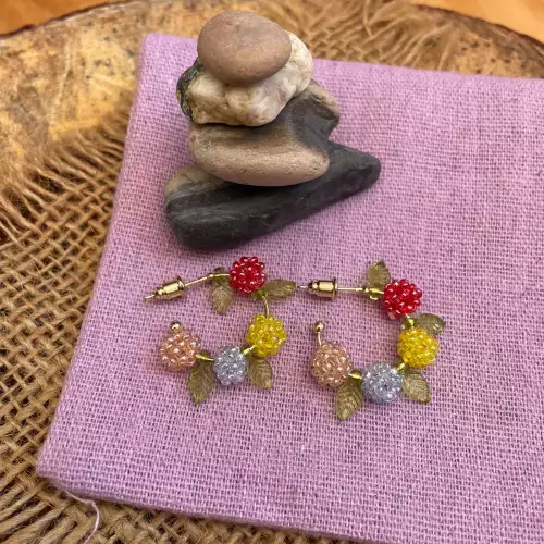 ARETES DE ARO FLORES