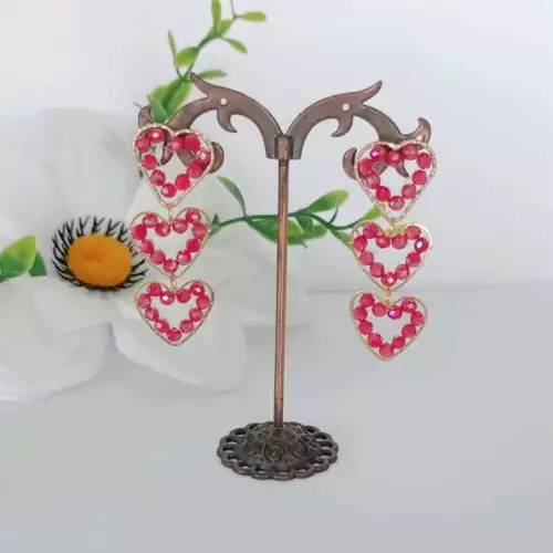 Aretes de corazón con cristal de Murano tejidos a mano