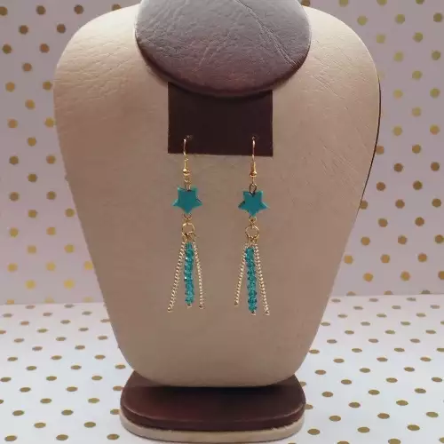 Aretes estrella turquesa con murano azul natural