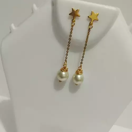Aretes largos estrella con perla blanca acero dorado