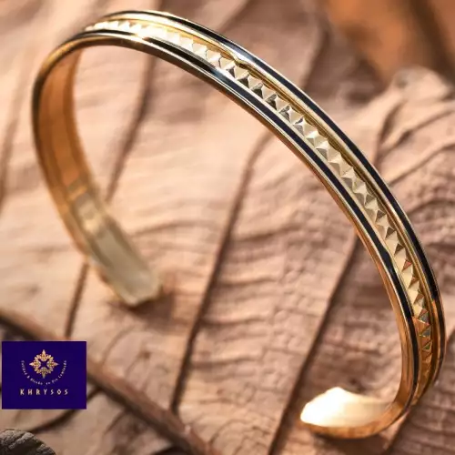 Brazalete Aslan en oro laminado con bordes negros