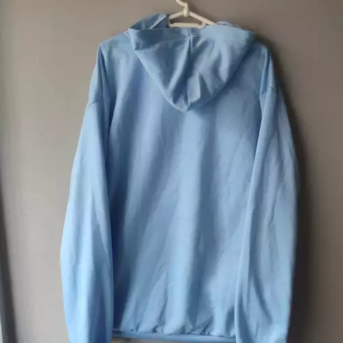 Buzo con capota azul bebé algodón licrado unisex