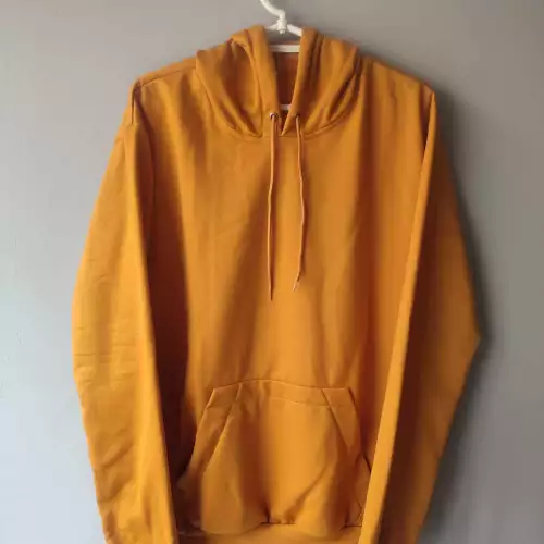 Buzo con capota mostaza algodón licrado unisex