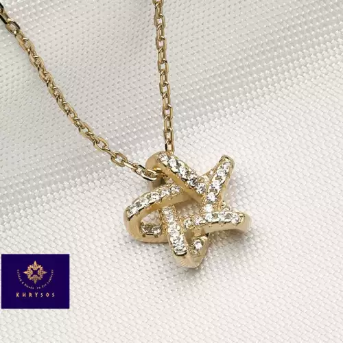 Cadena con dije estrella en plata 925 y oro 18K