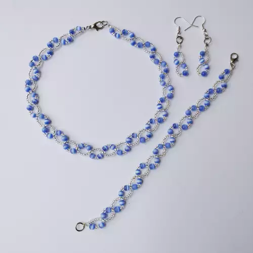 Choker aretes pulsera tejido ojo de gato azul