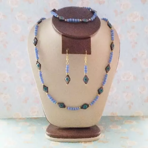 Collar, aretes y pulsera ojo de gato azul nacar