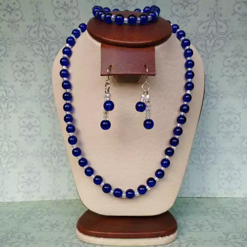 Collar, aretes y pulsera ojo de gato azul rey