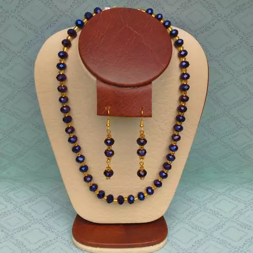 Collar y aretes en murano morado con chaquirón