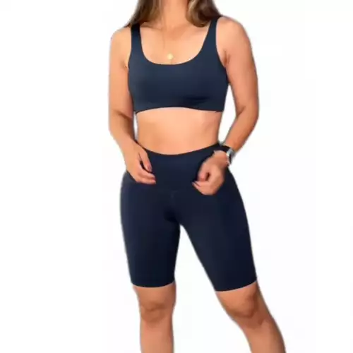 Conjunto deportivo mujer biker y top azul petróleo