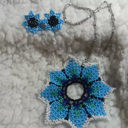 Conjunto flor celestial collar y aretes artesanal