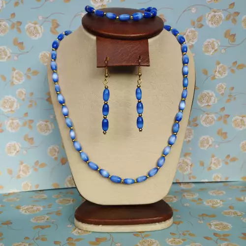 J212. LINDO JUEGO DE COLLAR, ARETES Y PULSERA EN OJO DE GATO AZUL