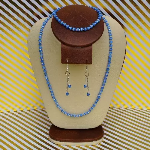 J280. COLLAR, ARETES Y PULSERA EN OJO DE GATO AZUL