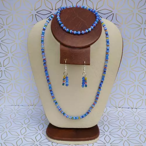 Juego collar, aretes y pulsera ojo de gato azul