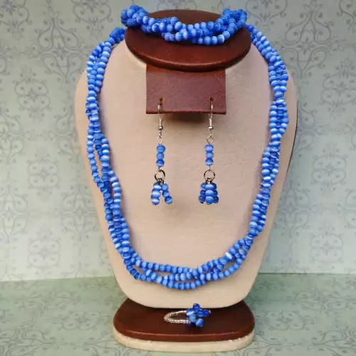 Juego de collar, aretes, pulsera y anillo ojo de gato