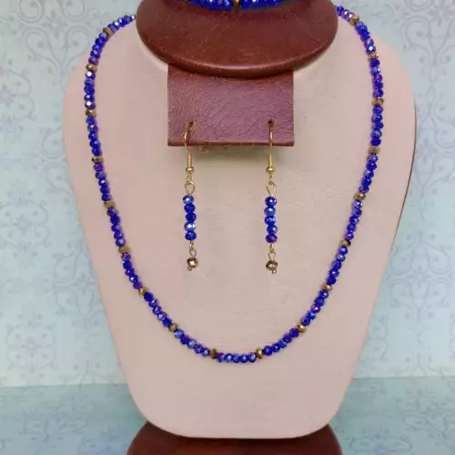 Juego de collar, aretes y pulsera en murano azul