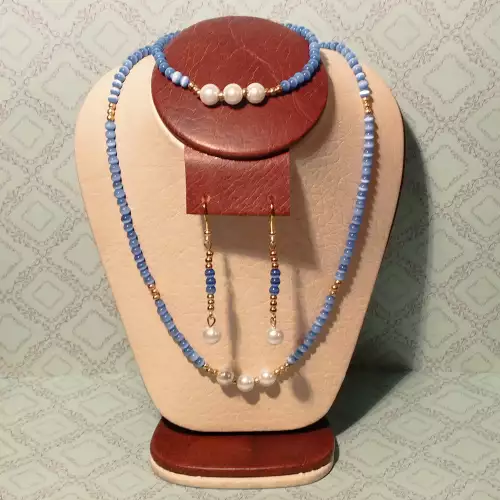 Juego de collar, aretes y pulsera ojo de gato azul
