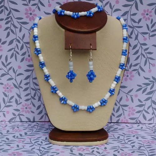 Juego de collar, aretes y pulsera ojo de gato blanco