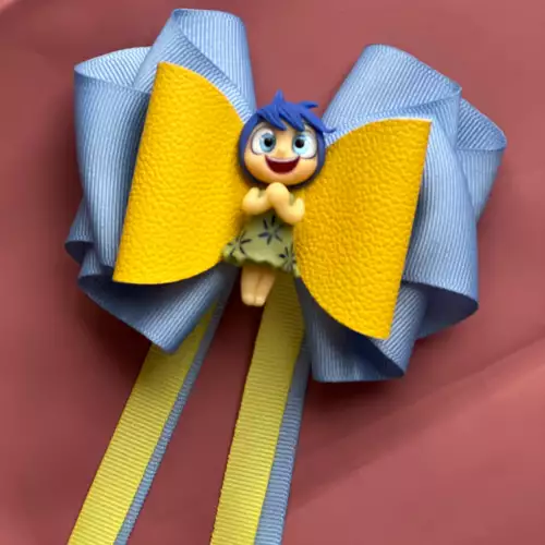 Moño Alegría con pinza diseño Intensamente 2 para niña