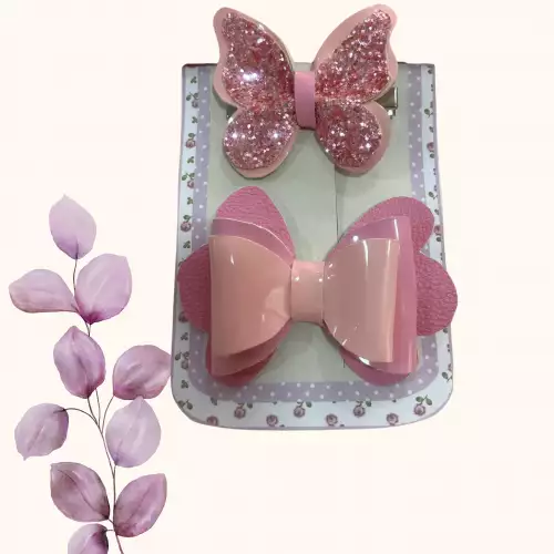 Moños coquette rosados para niña con glitter x 2