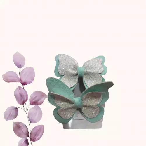 Moños coquette verde menta mariposa para niña x 2