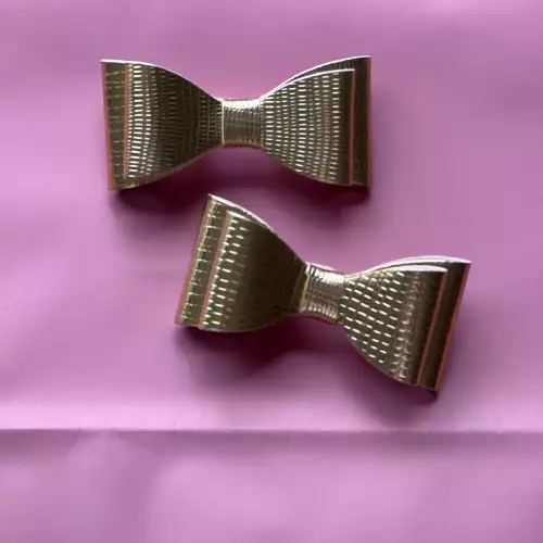 Moños para niña dorado con agarre seguro 7cm