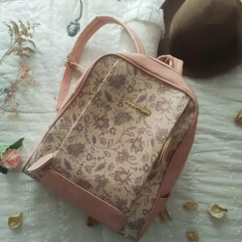 Morral rosa vintage con cremallera y bolsillos múltiples