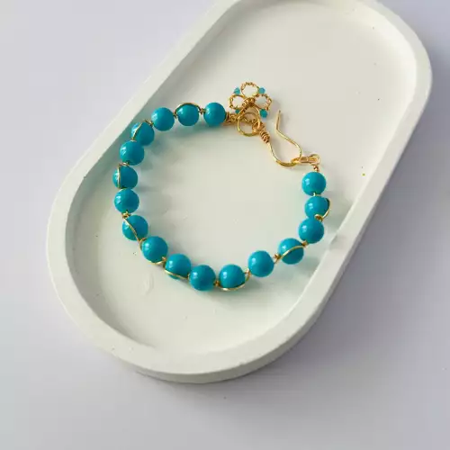 PULSERA DE PERLA DE VIDRIO EN ALAMBRE TURQUESA