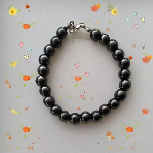 Pulsera en hematita acerina pulida para mujer