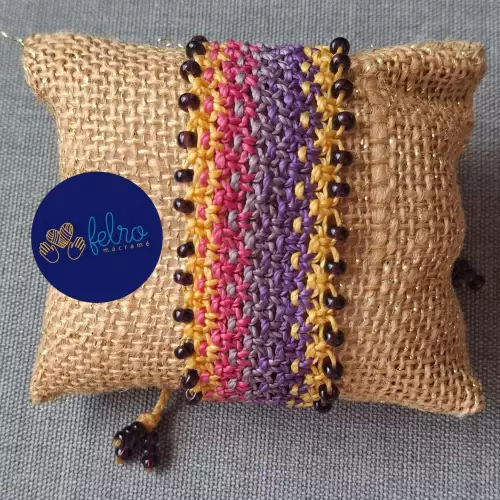 Pulsera macramé Aurora Mística tonos mostaza fucsia lila