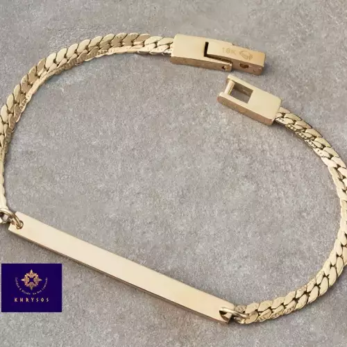 Pulso grabado con placa personalizable en oro