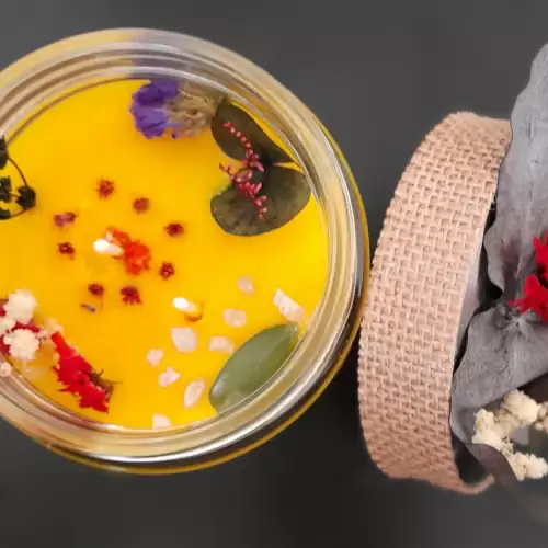 Vela decorativa 400gr cera palma con cuarzos y flores