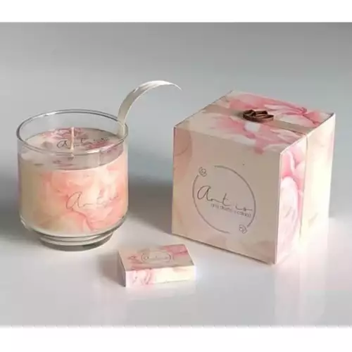 Vela decorativa aromatizada en vidrio con fósforos