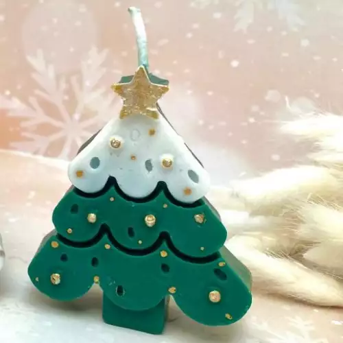 Vela navideña arbolito en cera vegetal verde y blanco