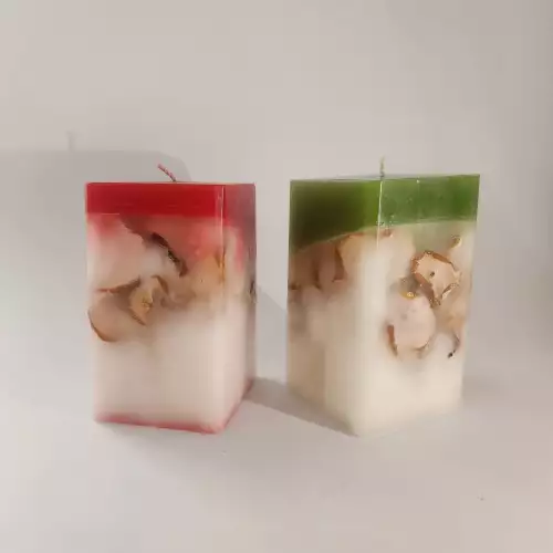 velas con manzanas.  velas elaboradas con manzanas naturales en las paredes, y aroma de manzana